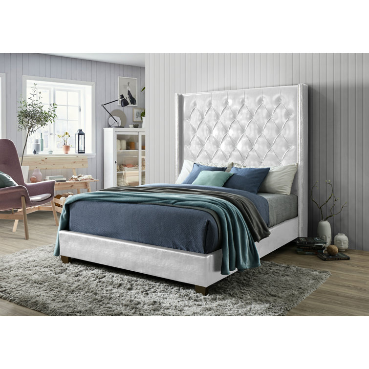 Grey upholstered bed with deals high headboard